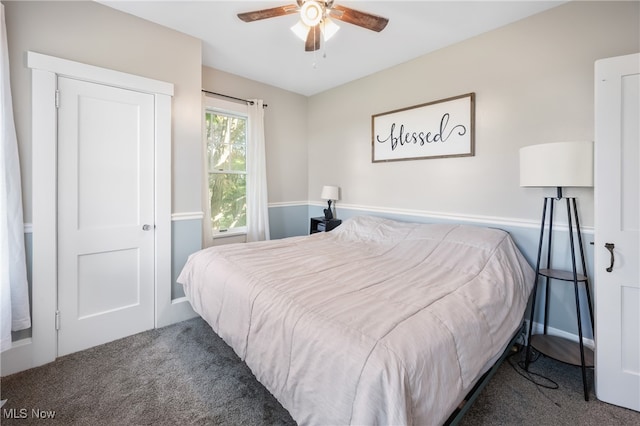 carpeted bedroom featuring ceiling fan