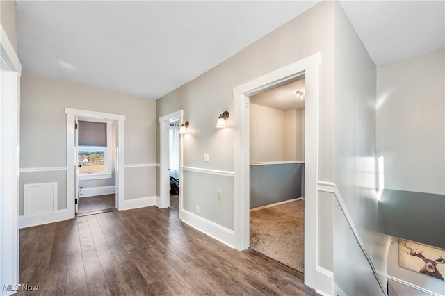 interior space with dark hardwood / wood-style flooring