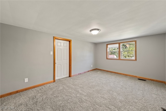 view of carpeted spare room