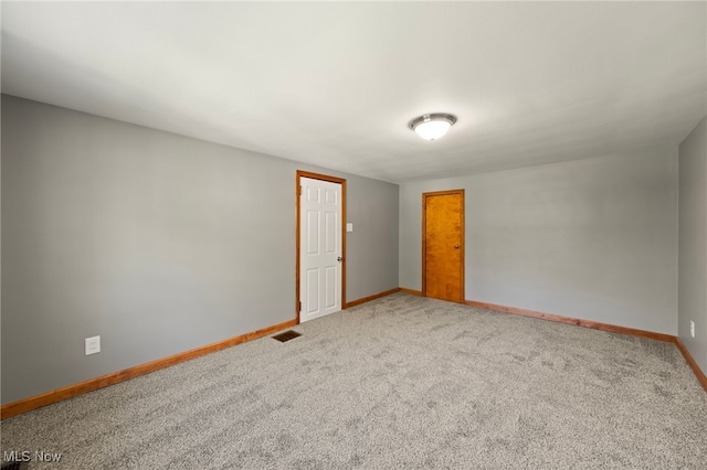 view of carpeted spare room