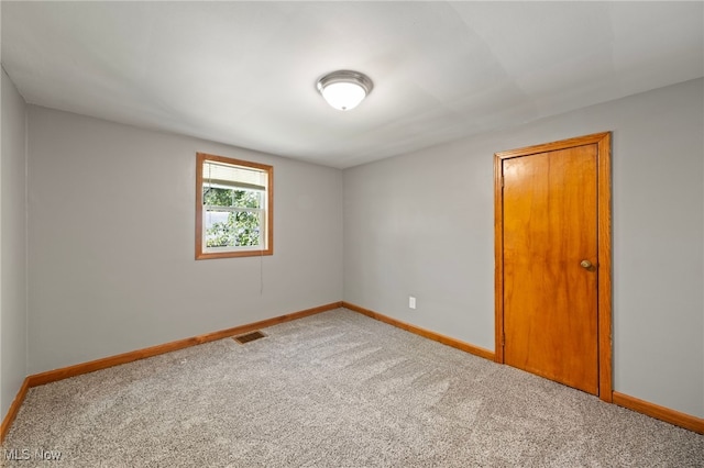 view of carpeted spare room