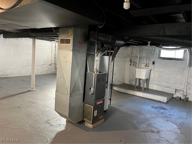 1504 W 19th St, Lorain, OH 44052 - basement with a sink and heating unit