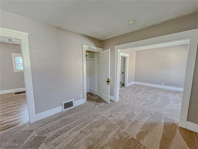 1504 W 19th St, Lorain, OH 44052 - unfurnished bedroom featuring carpet and a closet