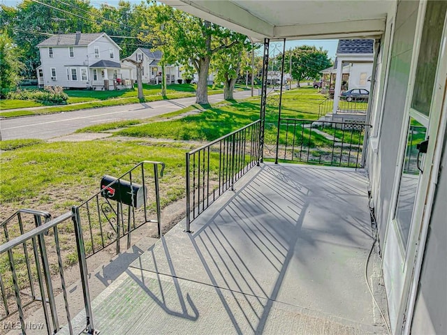 1504 W 19th St, Lorain, OH 44052 - porch with a residential view