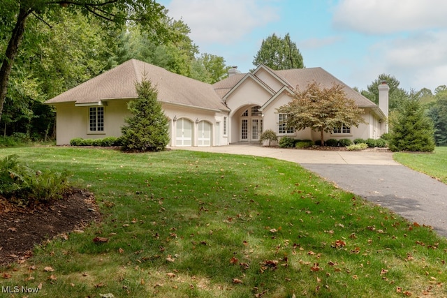 view of front of property with a front lawn