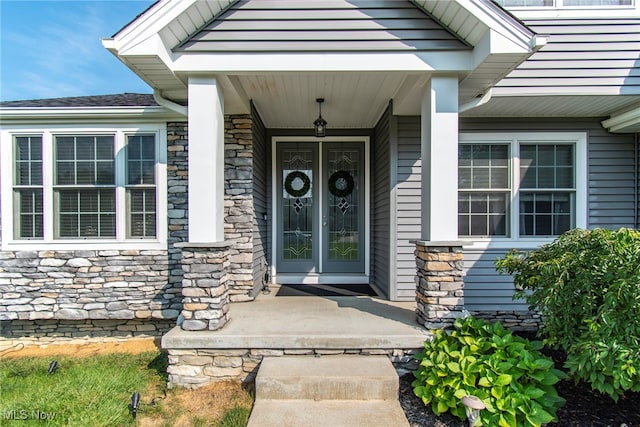 doorway to property featuring a porch