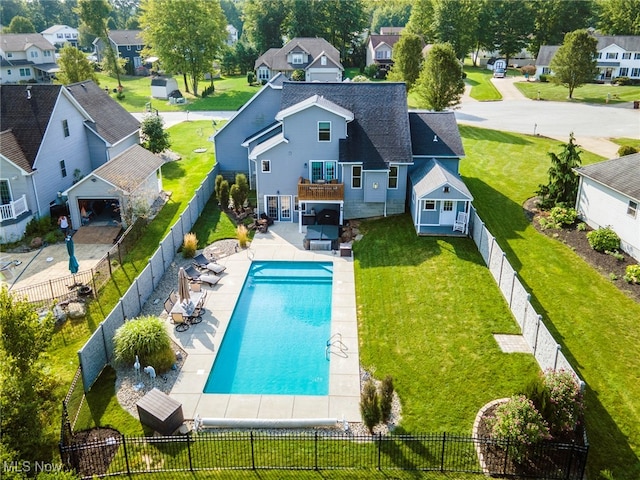 exterior space featuring a lawn and a patio