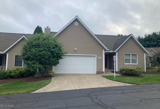 single story home featuring a garage