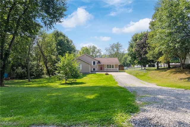 ranch-style home with a front yard