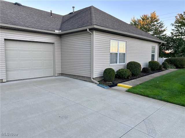 view of home's exterior featuring a garage