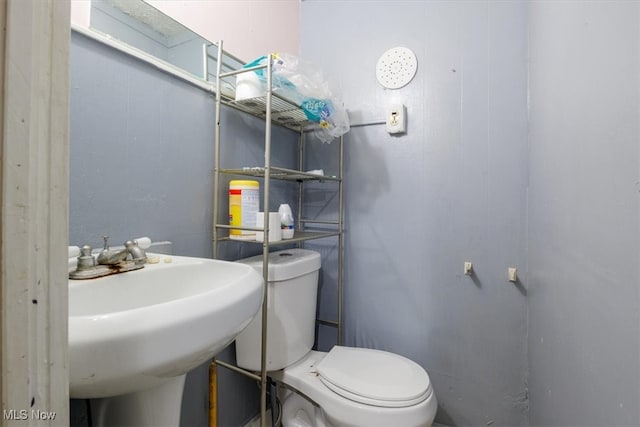 bathroom with sink and toilet