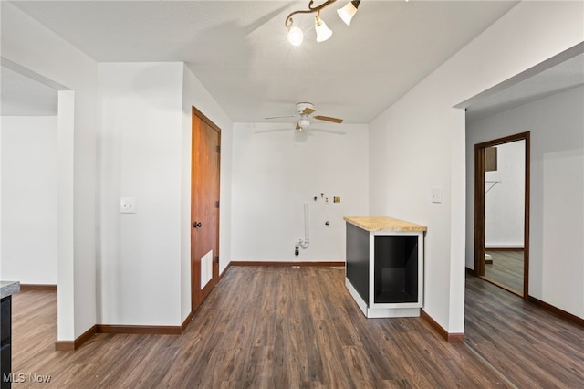 interior space with dark hardwood / wood-style floors and ceiling fan