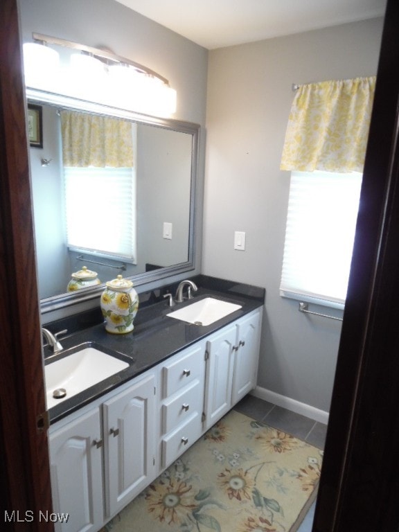 bathroom featuring vanity and tile patterned floors