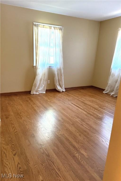 120 Woodcrest Dr, Marietta, OH 45750 - empty room with light wood-style flooring and baseboards