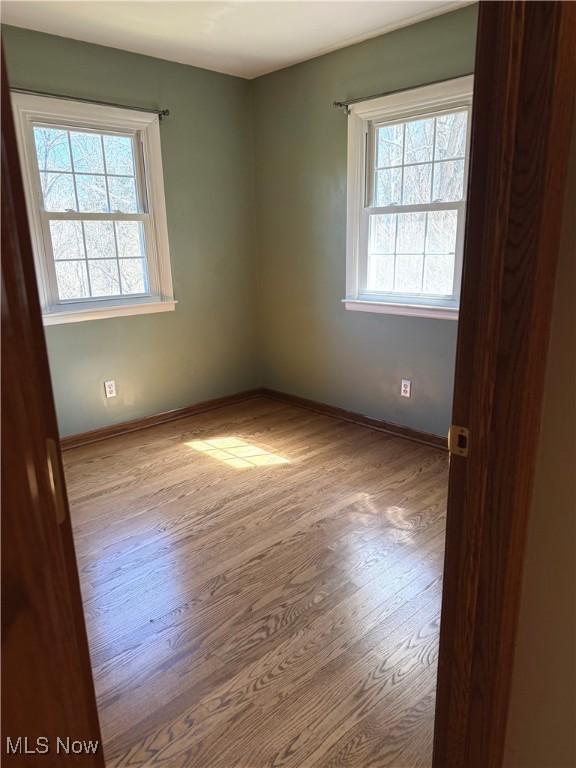 120 Woodcrest Dr, Marietta, OH 45750 - unfurnished room featuring wood finished floors and baseboards