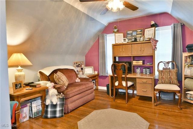 office space with lofted ceiling, ceiling fan, and hardwood / wood-style floors