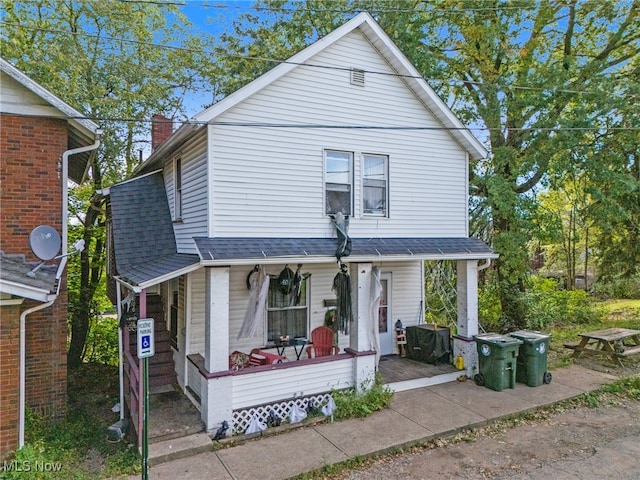 front of property featuring covered porch