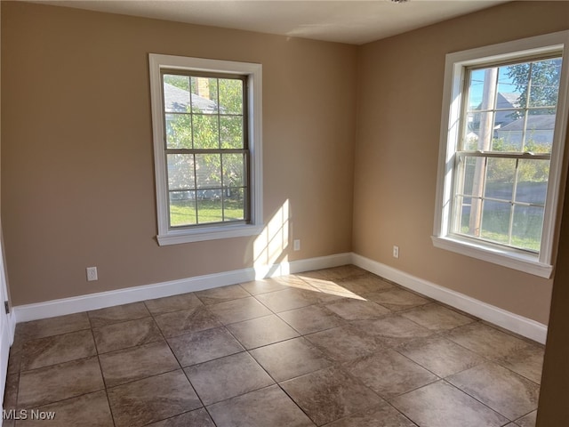 view of tiled spare room