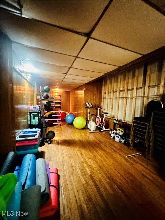 workout room with hardwood / wood-style flooring