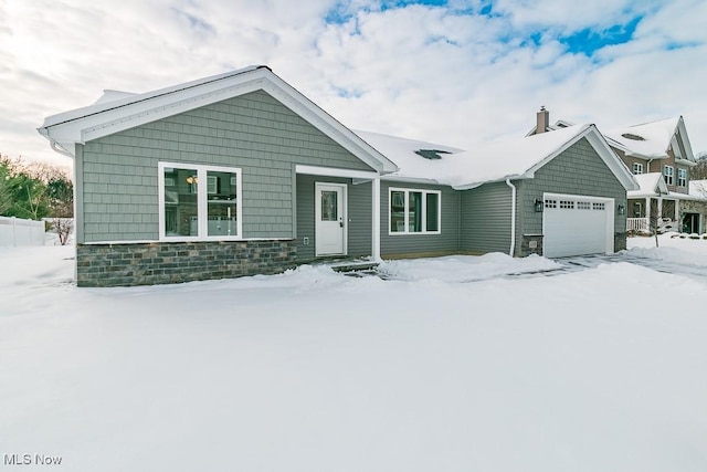 view of front of property with a garage