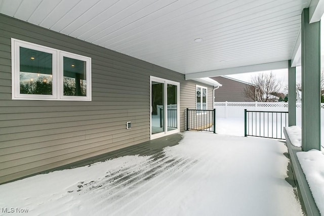 view of snow covered patio