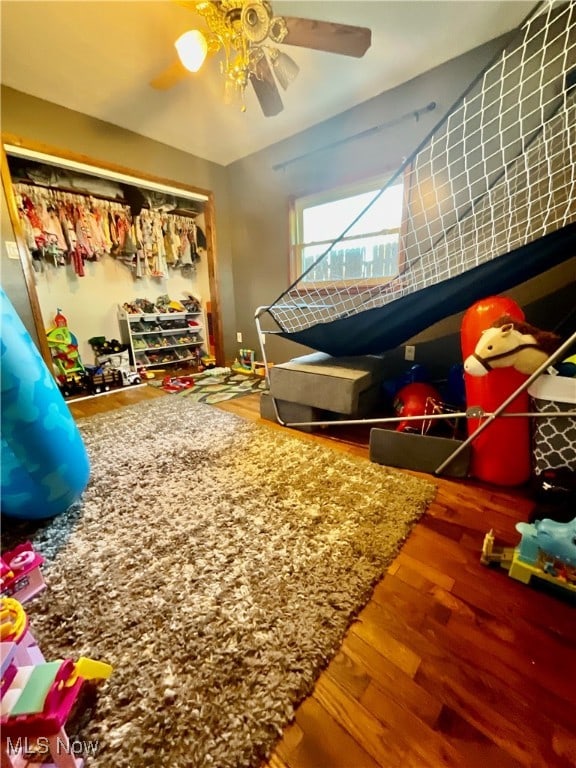 game room featuring ceiling fan and hardwood / wood-style flooring