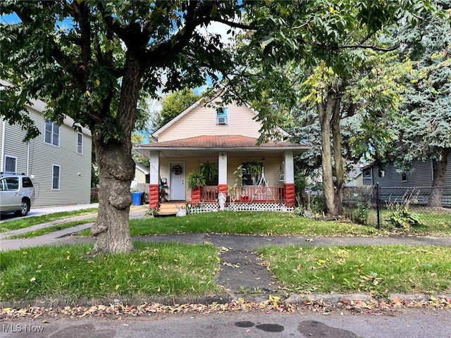 view of front of property featuring covered porch