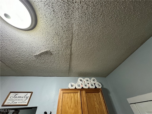 room details with a textured ceiling