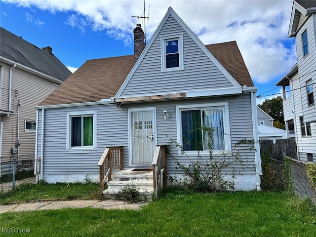 view of front of home with a front yard