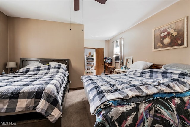 bedroom featuring ceiling fan and carpet floors