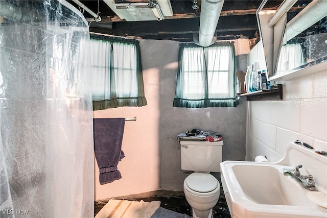 bathroom with sink and toilet