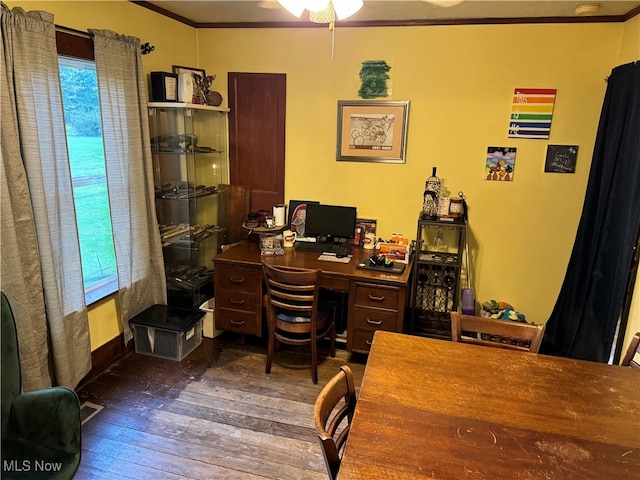 office area featuring ceiling fan, ornamental molding, and dark wood-type flooring