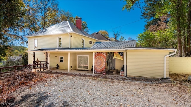 rear view of property with a patio area