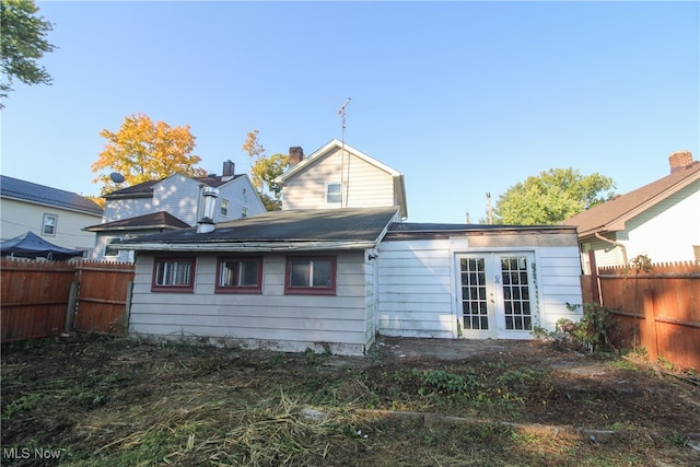 back of house with french doors