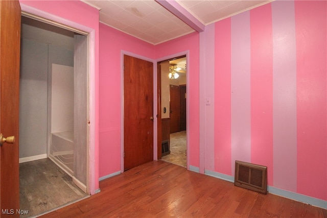 interior space featuring hardwood / wood-style flooring and ceiling fan