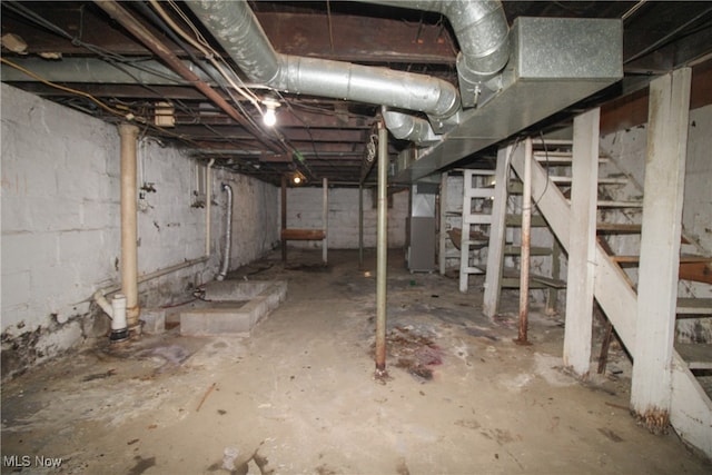 basement featuring heating unit