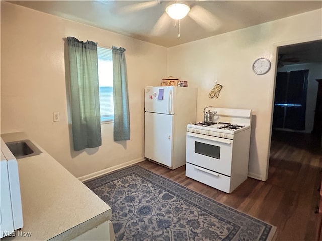 kitchen with ceiling fan, sink, dark hardwood / wood-style flooring, and white appliances