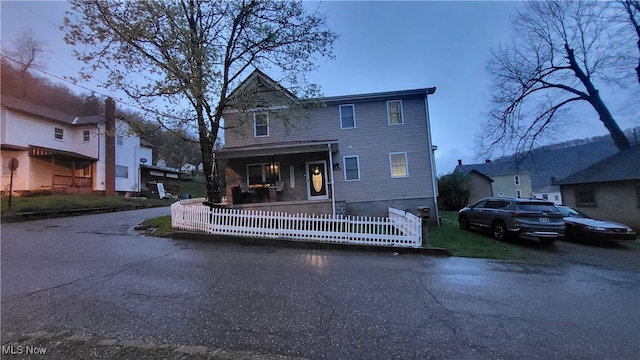 view of front of home featuring covered porch