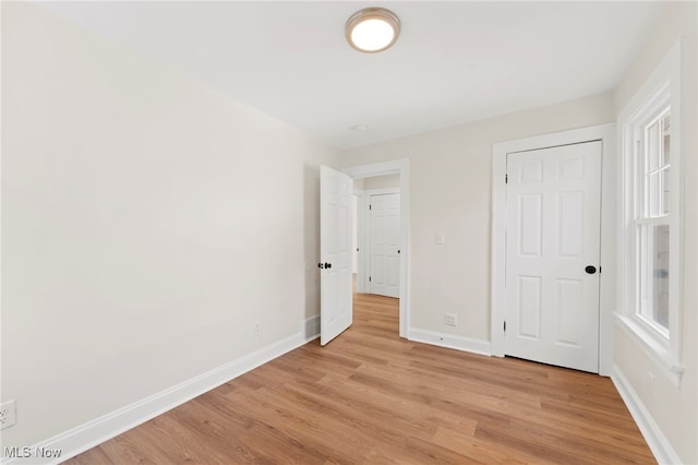 unfurnished bedroom with light hardwood / wood-style floors