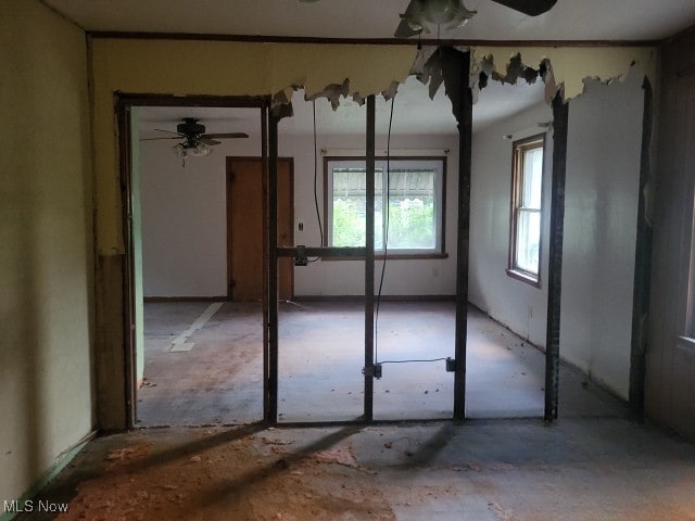 unfurnished room featuring ceiling fan