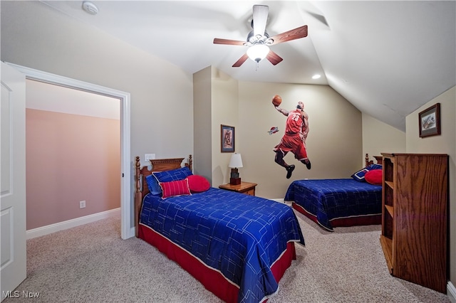 carpeted bedroom featuring lofted ceiling and ceiling fan