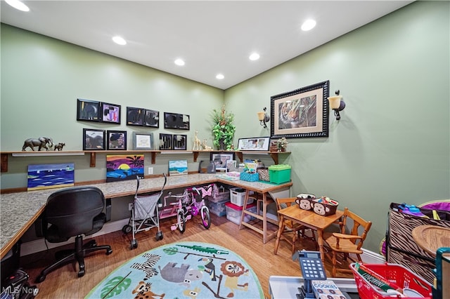 office area with wood-type flooring