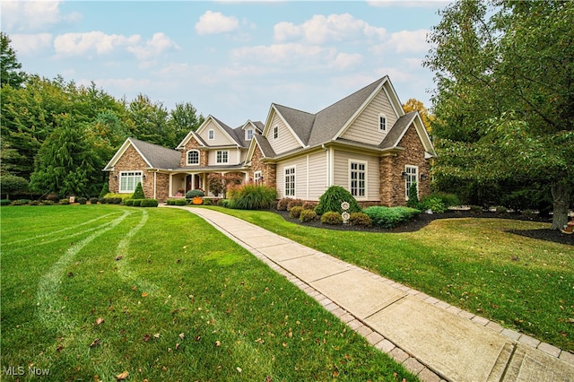 view of front of property with a front lawn