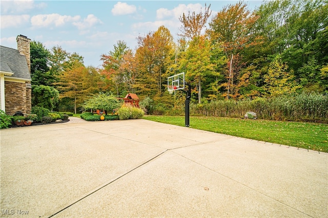 view of patio / terrace featuring basketball hoop