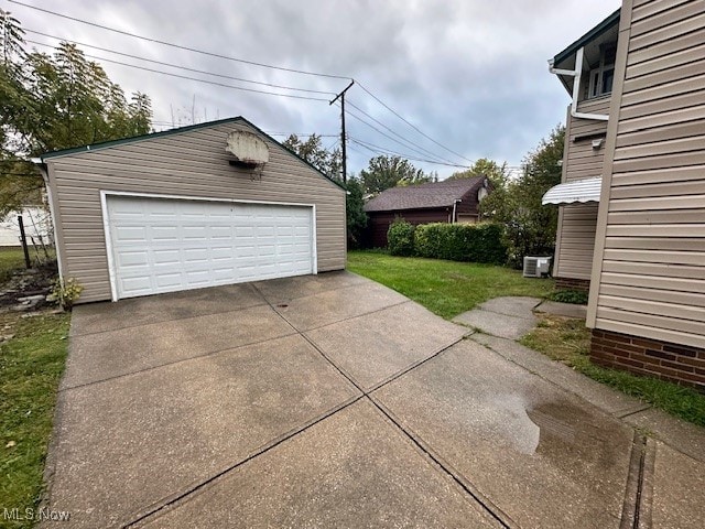 garage featuring a yard