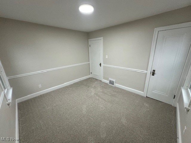 interior space featuring carpet flooring