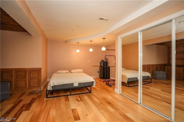 bedroom with wood-type flooring