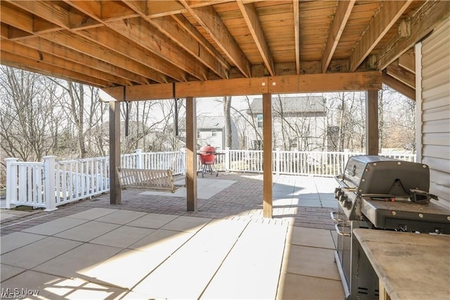 view of patio featuring a grill