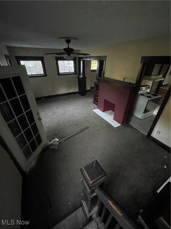 living room featuring ceiling fan