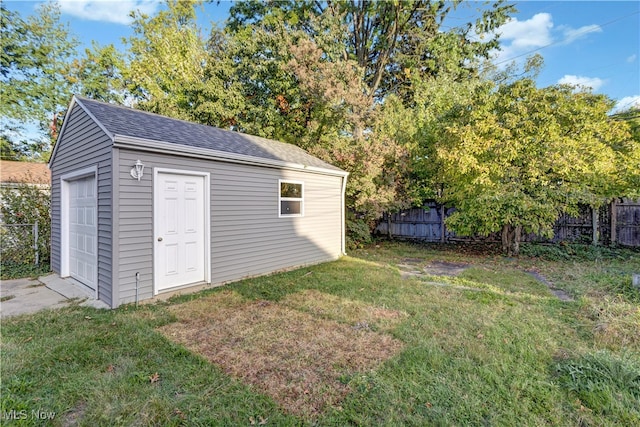 view of outdoor structure with a yard